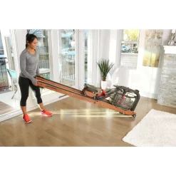 Row HX Trainer - Residential Water Rowing Machine – Life Fitness (ROW-HX) -Detecto Sales female exerciser moving row hx 0307 mr min