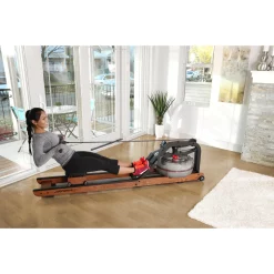 Row HX Trainer - Residential Water Rowing Machine – Life Fitness (ROW-HX) -Detecto Sales smiling female exerciser on row hx pulling 0086 mr min